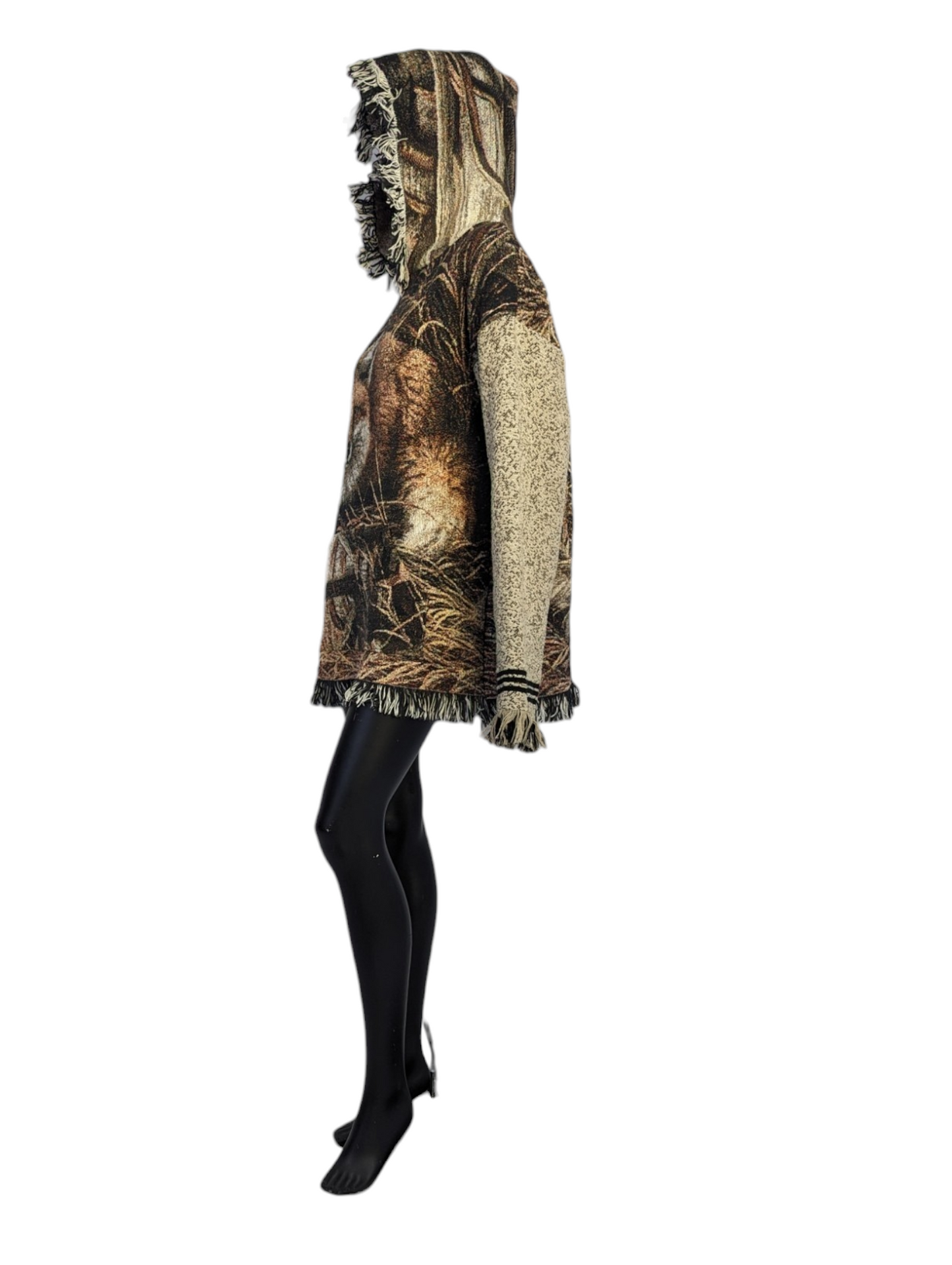 Side view of woman wearing fringe hoodie.