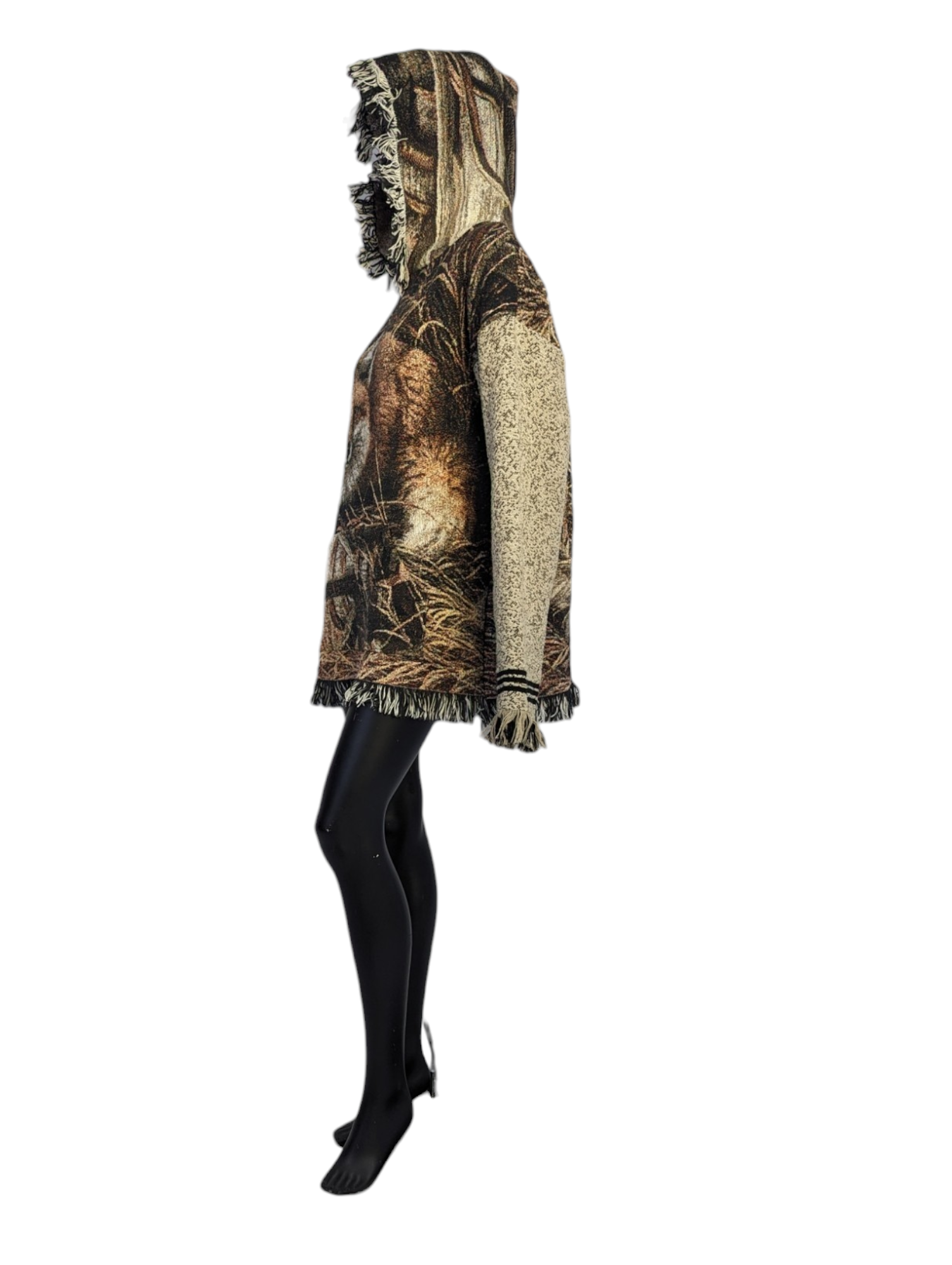 Side view of woman wearing fringe hoodie.